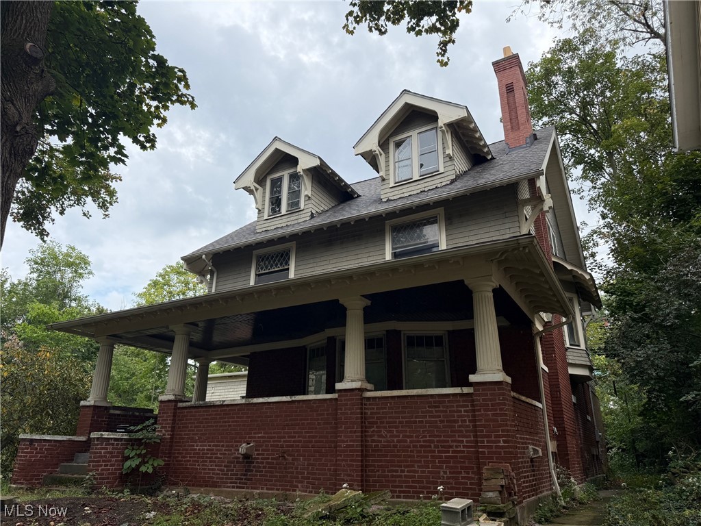 Opportunity to finish this spacious Front Porch Craftsman Colonial on a double lot in a prime location. The home has been gutted to the studs, and major infrastructure updates are already complete: plumbing, electric, waterproofing, and dual-zone HVAC. With about 4,000 sq ft including the 3rd floor, this property is ready for drywall and finishes—perfect for investors or owner occupants who want to customize. The 1st floor offers an open layout with a huge kitchen area and a large family/bonus room addition which could also be converted to a huge primary bedroom suite. Upstairs, the design includes a two-room primary suite with en-suite bath, two additional bedrooms, and laundry. The third floor features tall vaulted ceilings and plenty of additional living space. The lot is 100 feet wide (about 1/3 acre!) and includes the original stone 1-car garage, with plans available for an attached two-car garage. The unfinished basement (1,676 sq ft) provides excellent storage. Potential tax abatement available. 5/6 Bedrooms, 4.5 Bathrooms. Outstanding location near shops, schools, and parks, just seconds to Cedar/Fairmount, University Circle, Cleveland Clinic, and Downtown Cleveland.