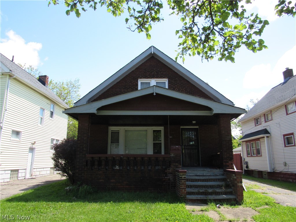 Great opportunity with this spacious all brick home located in the desirable Lee-Harvard area of Cleveland. This property offers flexible living space with 2 first-floor bedrooms and additional living quarters upstairs featuring a second kitchen and full bathroom that could be ideal for an in-law suite, extended family living, or additional functionality. The exterior features low-maintenance brick construction along with a detached garage. Inside, there is plenty of potential for an owner-occupant or investor looking to add value. The electric panel appears newer. Conveniently located near shopping, schools, parks, and major highways. Bring your ideas and see the possibilities this home has to offer! Sold as is.