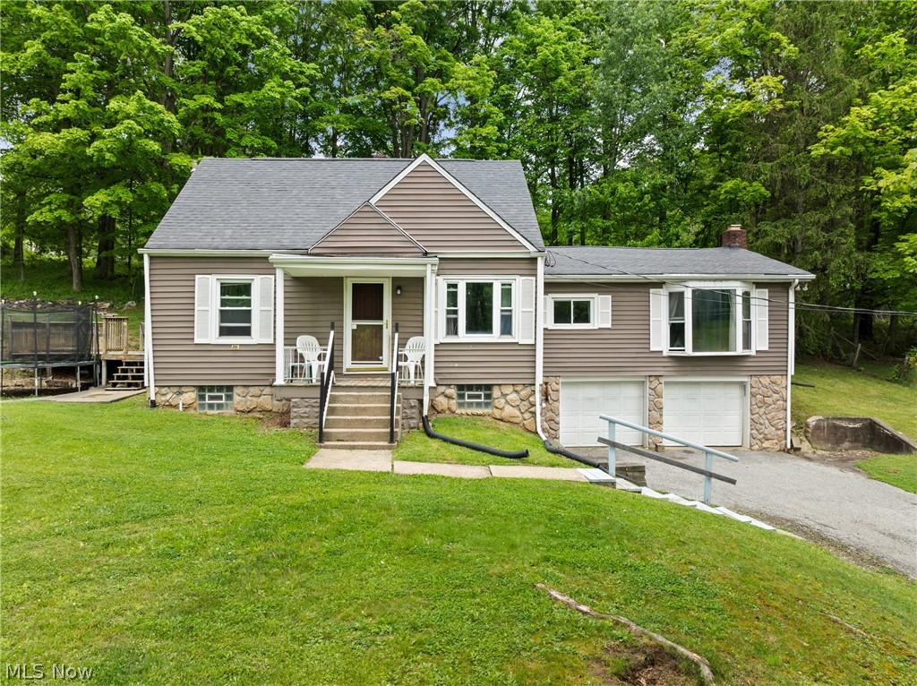Charming three-bedroom home on a spacious double lot with flexible living space and a private wooded backdrop, offering a peaceful setting that feels like home. 

Upon entering the home, there is a roomy and welcoming living room that provides a comfortable space to relax and gather. The galley kitchen opens seamlessly into a dining area, creating an easy flow for everyday living. Two of the bedrooms are conveniently located on the main floor. One of those bedrooms is oversized and features a fireplace and could easily function as a large family room or additional living space, adding even more versatility to the home.

French doors open to a large, inviting deck overlooking the serene wooded backdrop—an ideal spot for quiet mornings, evening unwinding, hosting friends and family, already set up for a future hot tub, as well as an additional space that is already prepared for a swimming pool. 

Additional highlights include a full basement equipped with two sump pumps and French drain, along with a convenient two-car attached garage, also with a sump pump and French drain.

Ready for your personal vision and updates to bring out its full potential, it’s worth seeing all this home has to offer! Mineral rights convey with the property.
