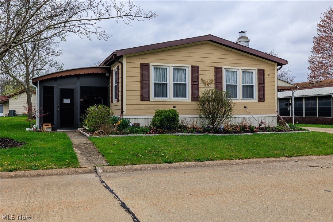 COLUMBIA PARK IS A 55 AND OLDER CONCEPT OF LIVING and is Ohio's Premiere Adult Land Lease Community! Amenities include: Gatehouse managed entrance! On site Shopping Plaza! On site Management! Walking Path/Dog Walking Path! Shuffleboard! Bocce Ball! Library! Crafts, and a Social Hall.  WELCOME !!!  This 1985 Schult Manufactured Home measuring 52 x 24 (1248 sqft.) has numerous upgrades.  This home features three (3) bedrooms two (2) full baths, formal living room with an electric fireplace, formal dining , nice kitchen and a three season sunroom measuring 23 x 10. The following upgrades are from 2017 when the current owner purchased this home.,  Newer roof, siding, skirting, windows, furnace and heat pump.  All appliances of which most are newer. The current owner had new gutters installed on the three (3) season room, redid the flooring in the master bathroom.  She also reconstructed the electrical outlet for the fireplace making it a designated outlet strictly for the fireplace.  She h