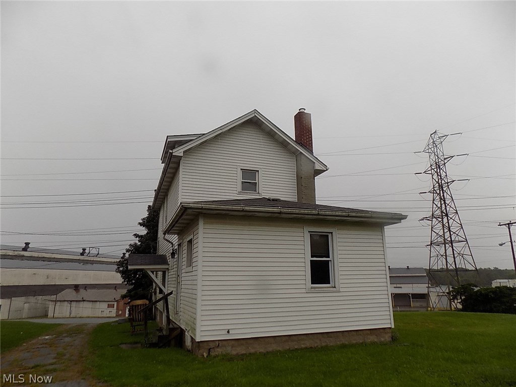 2 Story home with 2 bedrooms and 1 bath.  Also features an attractive kitchen and attractive dining room and living room floors.  Has a 2 car det garage, 2 lots  and alot more to offer at this price.  Call today