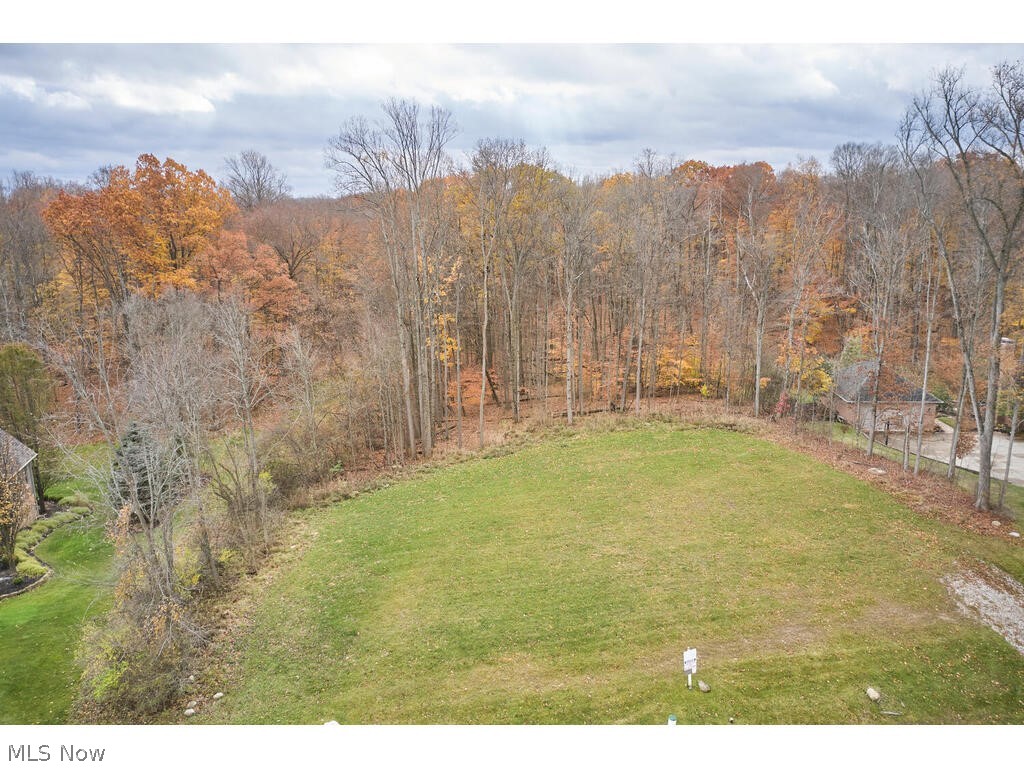 Bring you own builder to the beautiful Firestone Trace Development. This lot is over 1 acre with a long frontage and surrounded by lovely high end custom-built homes. Firestone Trace offers picturesque walking trails with water views and wooded areas, a clubhouse, tennis courts and a swimming pool.