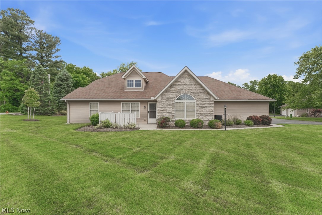 Enjoy low-maintenance condo living at 1210 Pebble Chase Cir NE in Massillon, close to shopping, dining, and everyday conveniences. This move-in ready 2-bedroom, 2-full-bath condo offers a comfortable one-level layout with vaulted ceilings throughout and newer flooring in the living and dining areas. The open living and dining space feels bright and inviting, with easy flow to the kitchen and outdoor patio. Kitchen has granite countertops and tile backsplash, appliances stay, including the refrigerator, stove, microwave, along with the washer and dryer. The primary suite features a private full bath and large walk in closet, while the second bedroom and full bath offer flexible space for guests, work, or hobbies. An attached 2-car garage with built-in storage adds everyday convenience. HOA fee is $350/month.