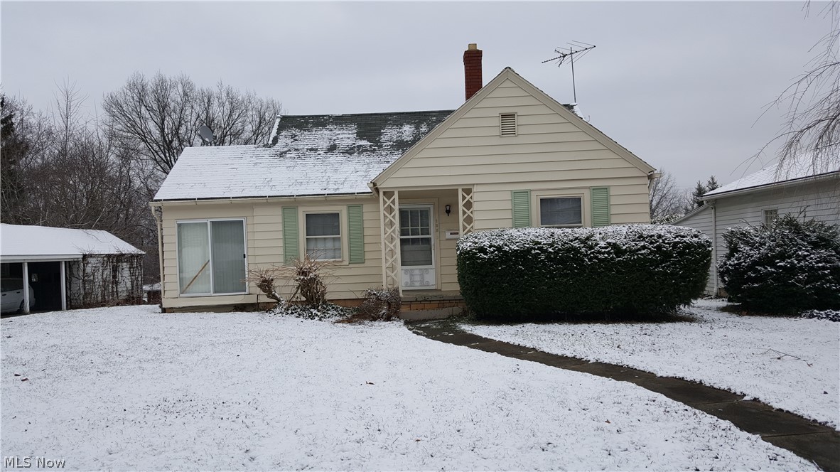 Charming 3-4 bedroom, 2 bath Bungalow with lots of potential... just needs some TLC and your personal touch!  Larger than it looks - approximately 1500 sq ft of measured living space - includes living room, kitchen, dining room, two bedrooms, a full bath, and sunroom all on the first floor.  Second floor has a third bedroom with tons of closet space, or would make an excellent hobby room.  Partially-finished, walkout basement with rec room, possible fourth bedroom or office, another full bath, and utility area w/laundry hookup.  Large backyard also has 8x12 storage shed.  Property being sold as-is, but there is plenty of opportunity, storage, and room to grow in this hidden gem - don't let it slip away.