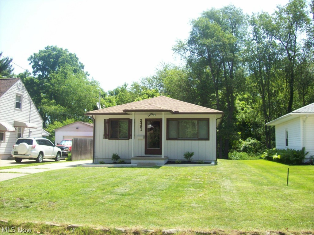This home is move in ready and includes many updates! The large family room has refinished hardwood floors and open to the kitchen/dining area. Kitchen has new flooring and includes your appliances. Large storage shed just added (10x12).  Three spacious bedrooms and full bath on main level. Another full bath in basement. Recent updates include all new electric, plumbing, furnace and paint throughout. Basement has also been painted with the floors