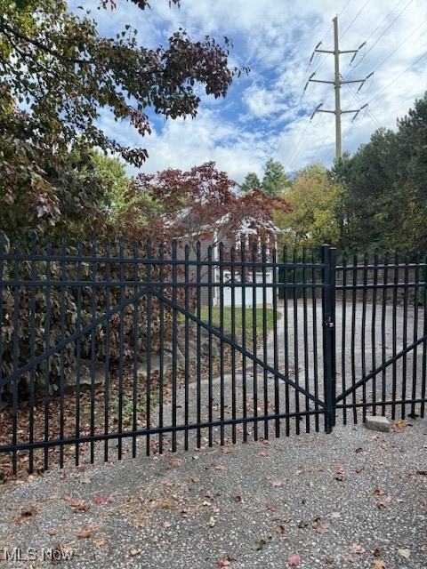 Bank-owned pool home in the Beachcliff One community of Rocky River!  Rehab was started and never completed.  Large great room, half bath downstairs, large master suite with vaulted ceilings, walk-in closet, fireplace, and skylights, upstairs laundry, 2-car attached garage, in-ground pool & spa, and partial view of Yacht Club and water.