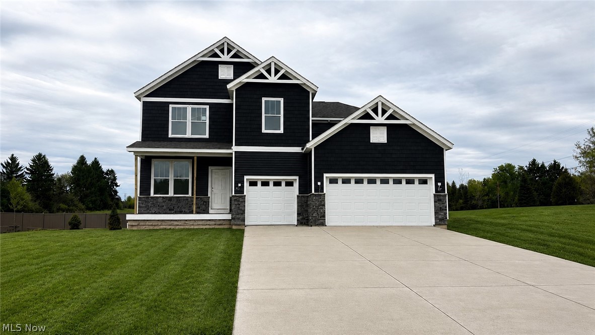 Stunning Quick Move-In new construction at Hawks Ridge — Medina School District! Welcome to Hawks Ridge, Medina’s newest sought-after community! This stunning quick move-in Decatur floor plan offers 3,222 sq. ft. of thoughtfully designed living space with 4 bedrooms, 3.5 baths, and an extended 3-car garage, available for move-in June 2026. Designed for both everyday living and entertaining, this home features a spacious gathering room extension, cozy fireplace, and a chef-inspired kitchen complete with built-in appliances, oversized island, and abundant cabinetry. Enjoy seamless indoor-outdoor living with both a charming covered front porch and rear deck, perfect for relaxing or hosting guests. The open-concept layout provides generous living spaces, spacious bedrooms, and elevated finishes throughout. Located just minutes from Historic Downtown Medina, shopping, dining, and within the highly rated Medina City School District, Hawks Ridge offers the perfect blend of luxury, convenience, and community living. Don’t miss your opportunity to own one of the few remaining quick move-in homes in this exciting new community!