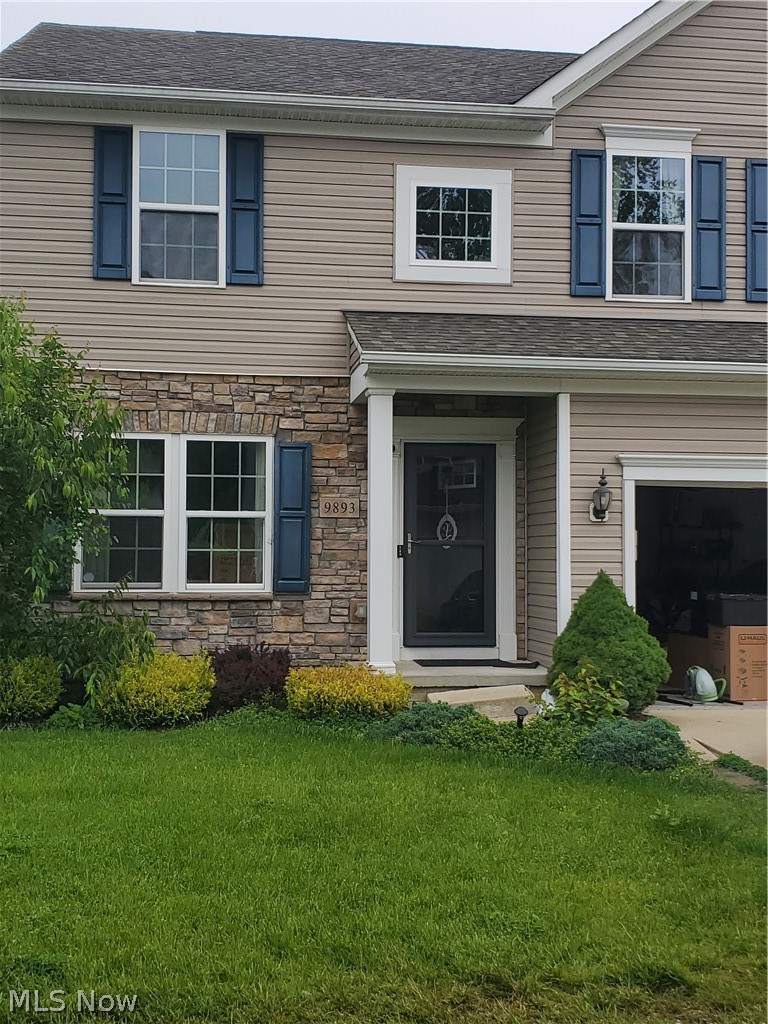 Welcome to 9893 Gabriel’s Way in beautiful Mentor, Ohio; a free standing, well maintained 4 bedroom 3.5 bath Colonial within the Mentor School District. Built in 2015, this home offers peace of mind of newer construction and offers spacious living for all ages of the family and at all facets of life.  Step inside to a warm and inviting floor plan featuring neutral tones, contemporary finishes with an abundance of natural lighting. The sitting room offers a comfortable relaxing area to read or just hang out, then flows effortlessly into a spacious living room creating an ambiance ideal for entertaining or everyday living.  The kitchen serves as the heart of the home, offering ample cabinetry, granite countertops, pantry, modern fixtures, and an open feel that connects seamlessly to the dining room and family spaces as well as access to the deck overlooking the reservoir.  The spacious 4 bedrooms upstairs offering a large primary suite that features a full bathroom with his and hers vanities and a sunken jet tub, as a well as a spacious walk in closet with built in shelving.  The laundry room is conveniently centrally located on the second floor as well. The partially finished walk out basement offers a full bathroom, large versatile space, perfect for entertaining or relaxing, game room with French doors leading outside.