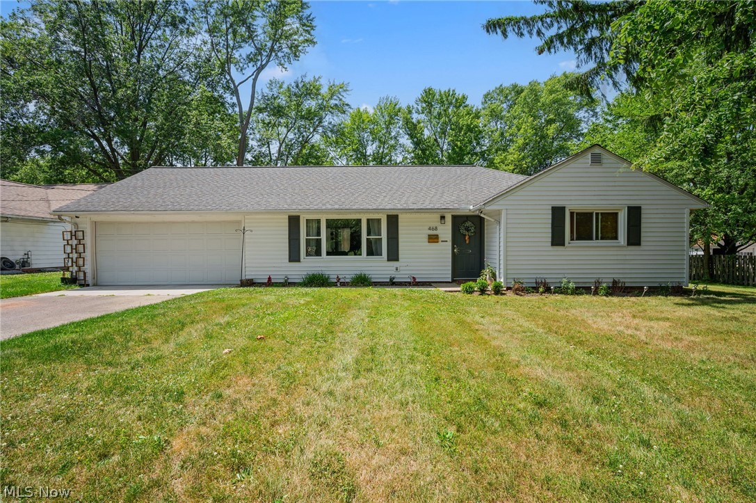 THIS COULD BE THE ONE!! Welcome to the mid-century home you have been looking for! This lovely 3 bed/2 full bath beauty greets you with charm as you enter the door, with a modern "tiffany-style" fixture and an inset display niche! Head to the left and you will find newer luxury vinyl plank tile that stretches through the living and dining space, with neutral wall color and recessed lighting to keep the space light and bright for your design accessories! In the kitchen you will find beautiful natural light, freshly painted cabinets, and a large pantry. Just off the kitchen is the laundry room, with more storage! The house rounds out with 2 updated full baths, and 3 bedrooms. All the bedrooms have nice sized closets and two additional storage closets for extra organizing! The park-like yard has plenty of room for pets and children, or for an amazing garden! There is also an extra-large shed that was grandfathered in by the city, for home and garden storage, and a new patio with privacy screen and a greenhouse, with irrigation! The home also has 2 new back doors and storm doors, newer vinyl windows, newer roof, gutters, and downspouts! All appliances stay! All that is needed is you!