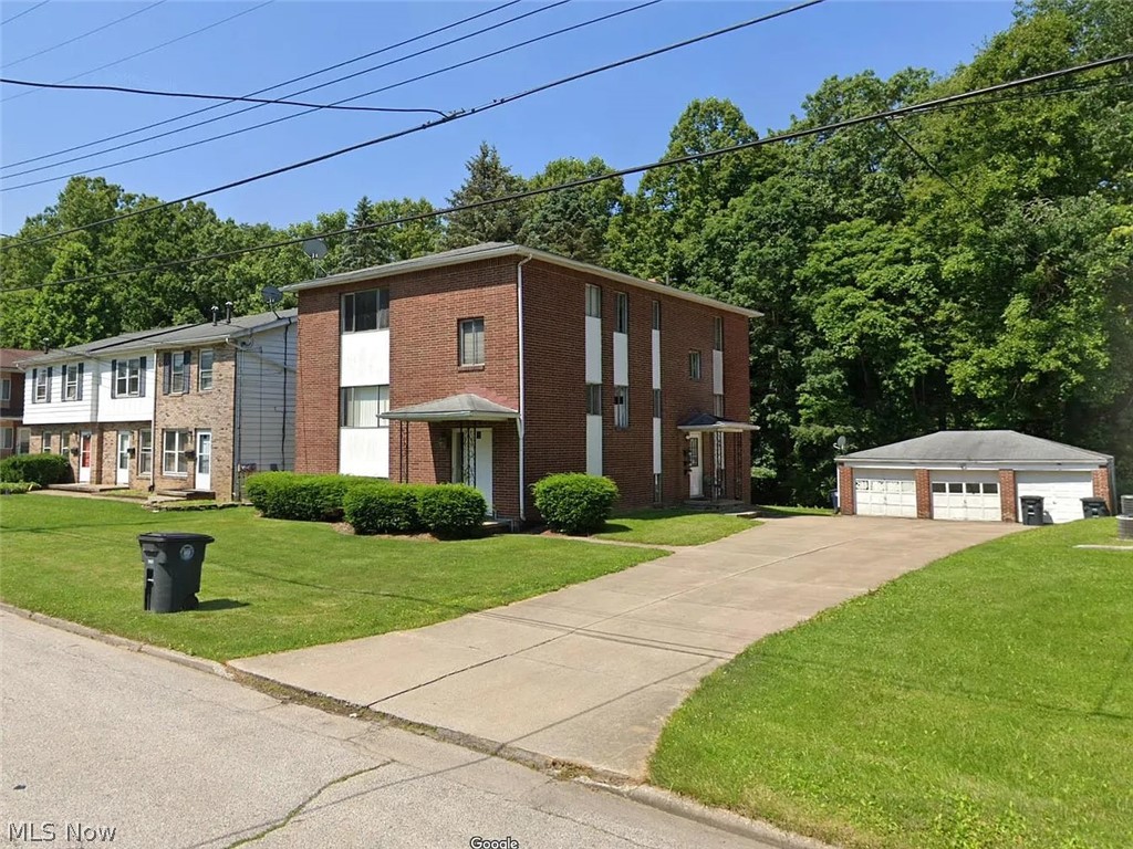 Here’s your chance to own a well maintained three unit brick apartment building in a prime Akron location. The property features two spacious 2 bed 1 bath units and one 1 bed 1 bath unit, each with its own dedicated garage bay and separate water, gas, and electric meters. One unit is currently vacant, offering immediate upside for an owner occupant or investor looking to place their own tenant at market rent. A lower level common area provides separate laundry hookups for each unit. Recent upgrades include new flooring in all units within the past two years. Mechanical systems are in good condition, helping keep maintenance low and operations reliable. Tenants pay all utilities except common electric, which the owner covers for exterior lighting and shared spaces. Located on a quiet dead end street with Sand Run Metro Park as your backyard, yet just minutes from Summit Mall, Stan Hywet, and quick access to I 77, this property offers a rare mix of convenience and peaceful surroundings. Public transit is also nearby.