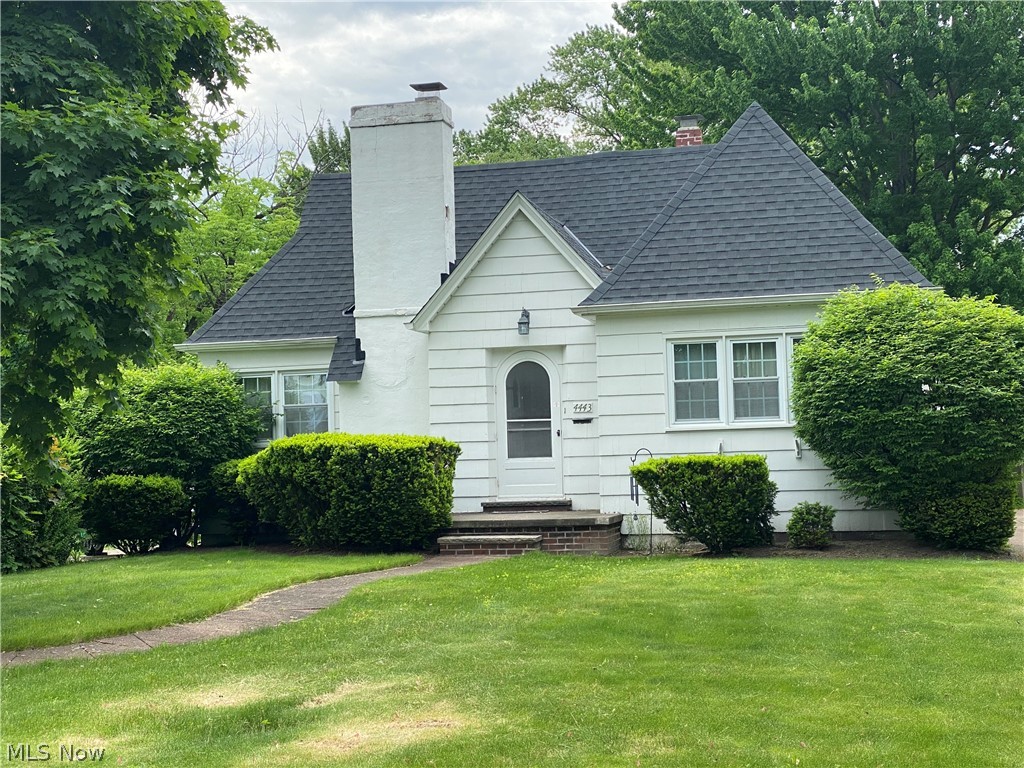 Location, Location, Location -   conveniently located to the airport, shopping, dining and entertainment!  This ranch home features a large living room,  formal dining room, eat in kitchen with oven/range, refrigerator, dishwasher and disposal,  2 spacious bedrooms, 2 full baths,  beautiful hardwood floors, sun room, recreation room in the lower level with extra space for a play or computer area, 2 c garage with openers and a large back yard which would be great for family fun and entertaining.  Additional information;  glass block windows, replacement windows 2003, shingles 2014 &  sewer line 2007.  One year home warranty provided by the seller for your peace of mind.