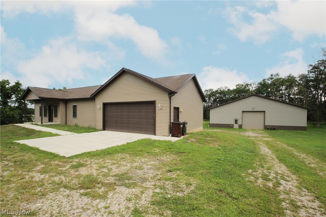 This property presents a rare opportunity to own industrial-zoned real estate in Medina with the unique ability to both operate your business and live on-site in a recently constructed home. The 1,232 SF, 2-bed/2-bath residence—built in 2023 and offered at $275,000 ($223/SF)—is ideal as a primary residence, office conversion, or income-producing rental. Complementing the home is a 6,300 SF pole barn/shop built in 2003 and offered at $475,000 ($75/SF). The shop features finished garage space with 16' ceiling clears, an office, kitchenette, loft, restroom, and three 12' x 12' drive-in doors, along with a rear storage section boasting 18' ceiling clears. The property is equipped with a brand-new septic system, public water, and access to a natural gas well that provides gas at little to no cost. Zoned I-1 Industrial in York Township—and benefiting from a conditional use variance allowing residential use—this versatile property is ideal for trades, service providers, auto repair/detailing, contractors, landscapers, light manufacturers, or small industrial users seeking a strategic Medina County location. Whether you choose to live where you work within the desirable Buckeye Local School District or operate your business with the added benefit of passive rental income, this offering delivers exceptional flexibility and value at just $99/SF.