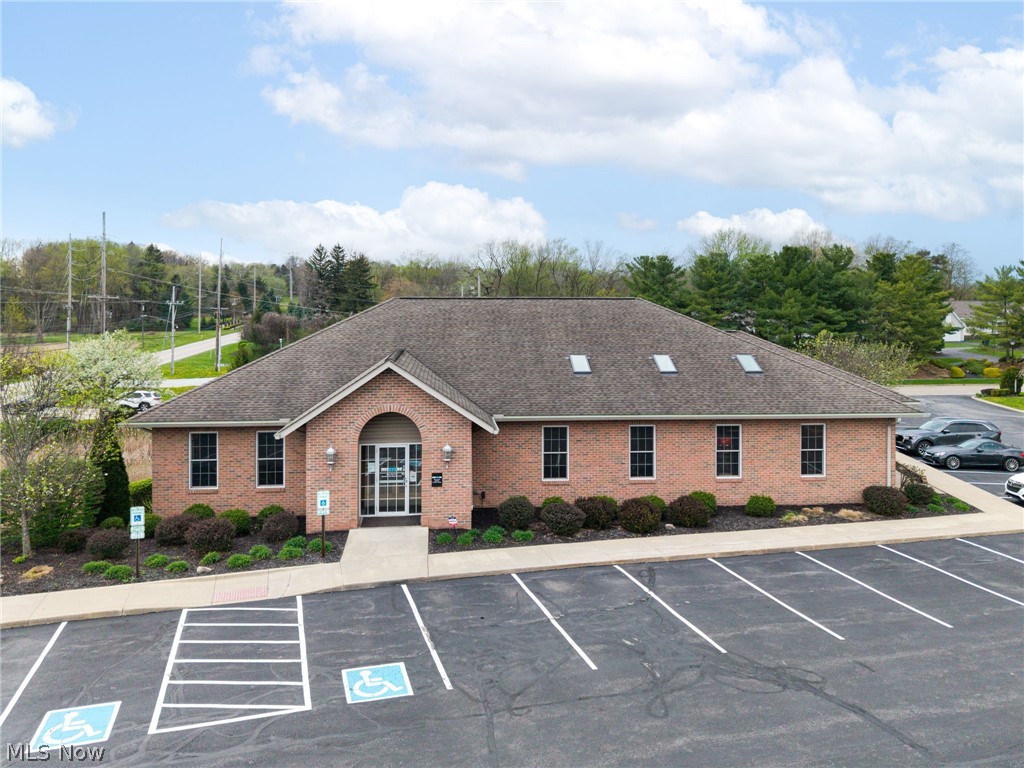 This well-maintained office building pre4sent an excellent investment opportunity, complete with a secured five-year lease in place with the current tenant-offering immediate, relabel income from day one. This property features approximately 3,895 square feet of functional space, including six exam rooms, a spacious waiting area, and a dedicated front desk/reception area designed for efficient operations. Additional amenities include employee work space, three half baths and full basement with employee lounge. providing ample storage or potential for expanded use. A turnkey investment with strong fundamentals- ideal for investors seeking stability and long-term value.