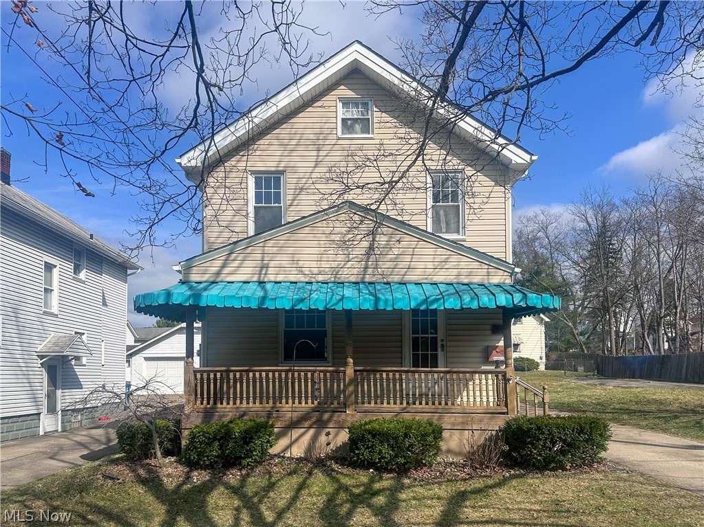 Your home search ends here! This move-in-ready two-story home offers 3 bedrooms, 2.5 bathrooms, a large covered front porch, back patio, and a huge fenced-in backyard that allows privacy and safety for the kids and pets to play. Updates include the furnace (2024), all vinyl windows (2015), glass block windows in the basement, light fixtures throughout, newer vinyl siding, metal roof on the garage, and an updated electrical panel. Original hardwood floors grace the living room and bedrooms, while arched doorways and built-ins showcase the home's classic charm. The eat-in kitchen offers butcher block countertops, beautiful tile backsplash and a breakfast bar for casual dining. A Whirlpool double oven, refrigerator, range top, dishwasher and a stainless steel farmhouse sink provide everything needed for effortless cooking and cleanup. The basement offers a laundry area with a Maytag washer and dryer, a full bath and ample storage. But wait...there's more! An oversized detached garage provides parking for FOUR cars, plus room for toys, lawn equipment and seasonal items. This charming house is conveniently located near shopping, restaurants, and major interstates, in a quiet neighborhood with sidewalks and trees. Schedule your showing today. You won't be disappointed!