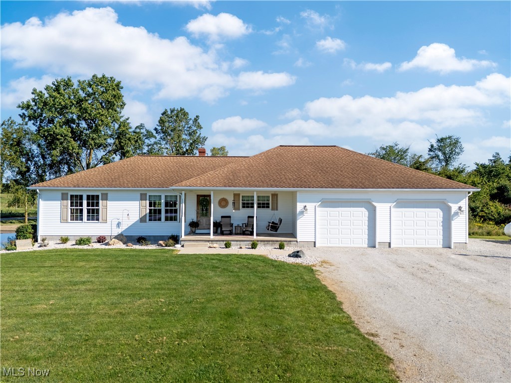 Welcome to this spacious 5-bedroom ranch home on 2.39 acres in the desirable Crestview Local School District. With an open-concept living room, kitchen, and dining room, this home is perfect for both everyday living and entertaining. The master suite, conveniently located just off the dining room , offers a large bedroom, two closets, and a private full bathroom. The main-floor laundry adds extra convenience to your daily routine. The finished walkout basement expands your living space with two additional bedrooms, a large family room, and a workshop area with direct access to the backyard. Step outside and enjoy the peaceful setting from the spacious back deck overlooking your private yard. The property also features a swimming pond. Don't miss out on this beautiful home!