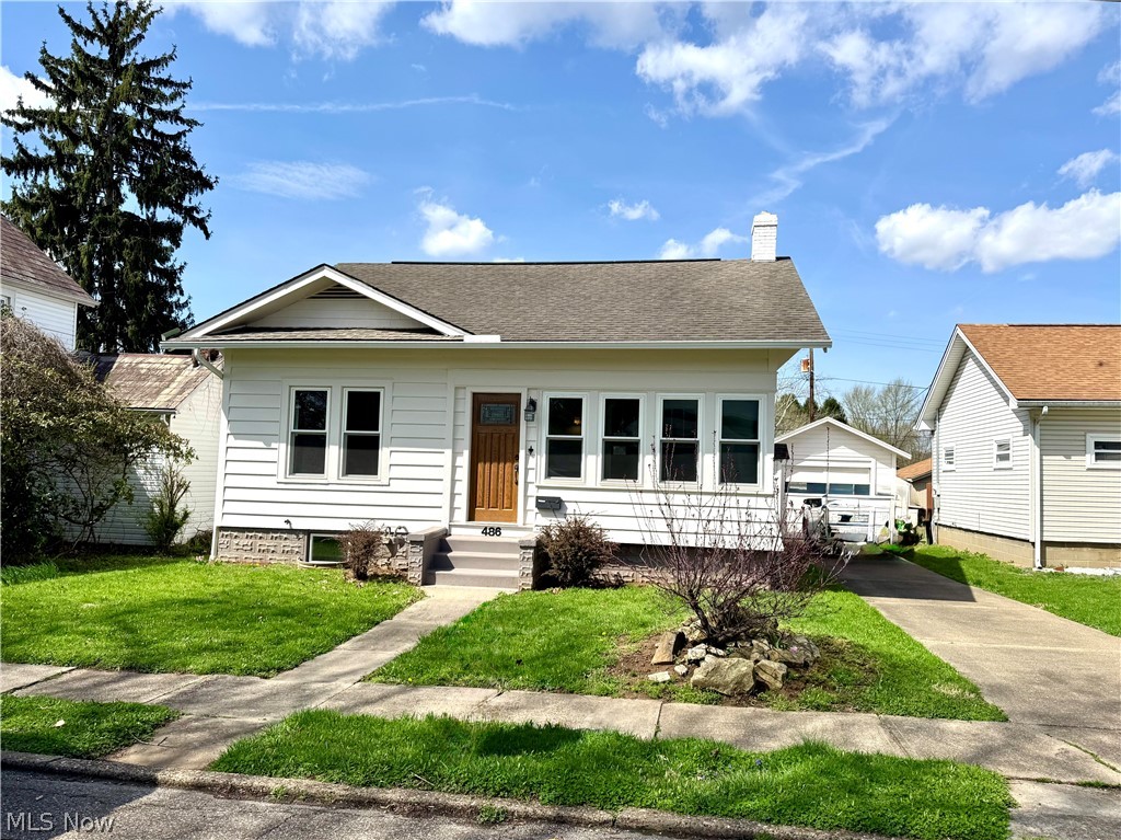 This spotless, well cared for home is ready for new owners! The owner has carefully updated this home with keeping important historical features in mind; original hardwood floors and trim that have been refinished, lovely fireplace and antique light fixtures, and the 4-season porch is the perfect place for all of your plants to live a happy life!  The beautiful Amish built kitchen includes all appliances, and the bathroom is already updated and ready to go! The seller says the clean basement was used as an extra bedroom once upon a time. The exterior of the house has replacement windows with transferable warranty, and the redwood siding had a fresh coat of paint last year. Enjoy immediate possession and move right in!