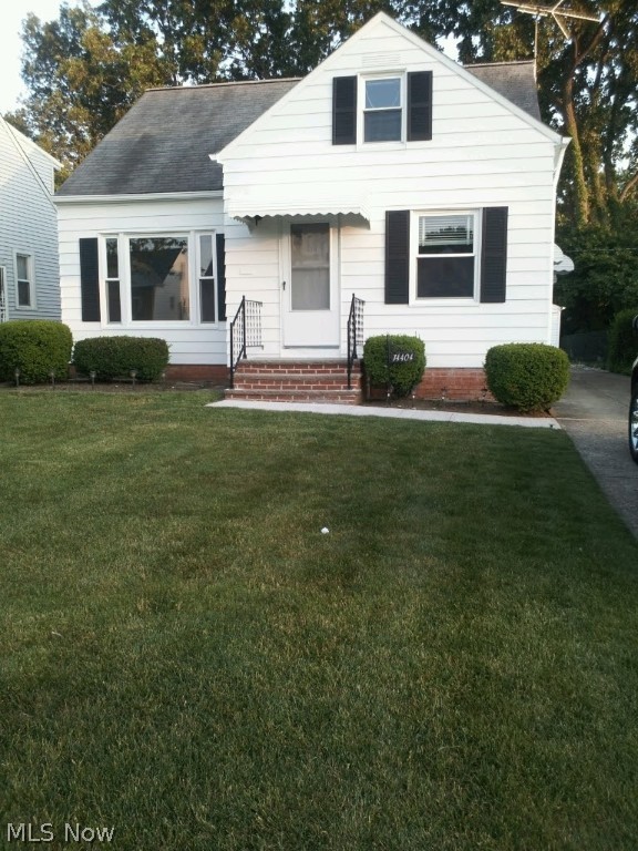 Beautiful large master 3 bedroom Bungalow featuring a modern updated Kitchen with Ceramic flooring, a large living room with beautiful hardwood flooring throughout. The newly remodeled bathroom has new cabinets and ceramic tub surround. The large second floor master bedroom is fully carpeted and has an office nook and walk-in closet. The beautiful partially finished basement has been freshly painted and features new carpeting and  a 1/2 bathroom. This cozy home's electrical box has been updated and features Central Air, Vinyl windows, lots of closet and storage space and a large fenced in back yard