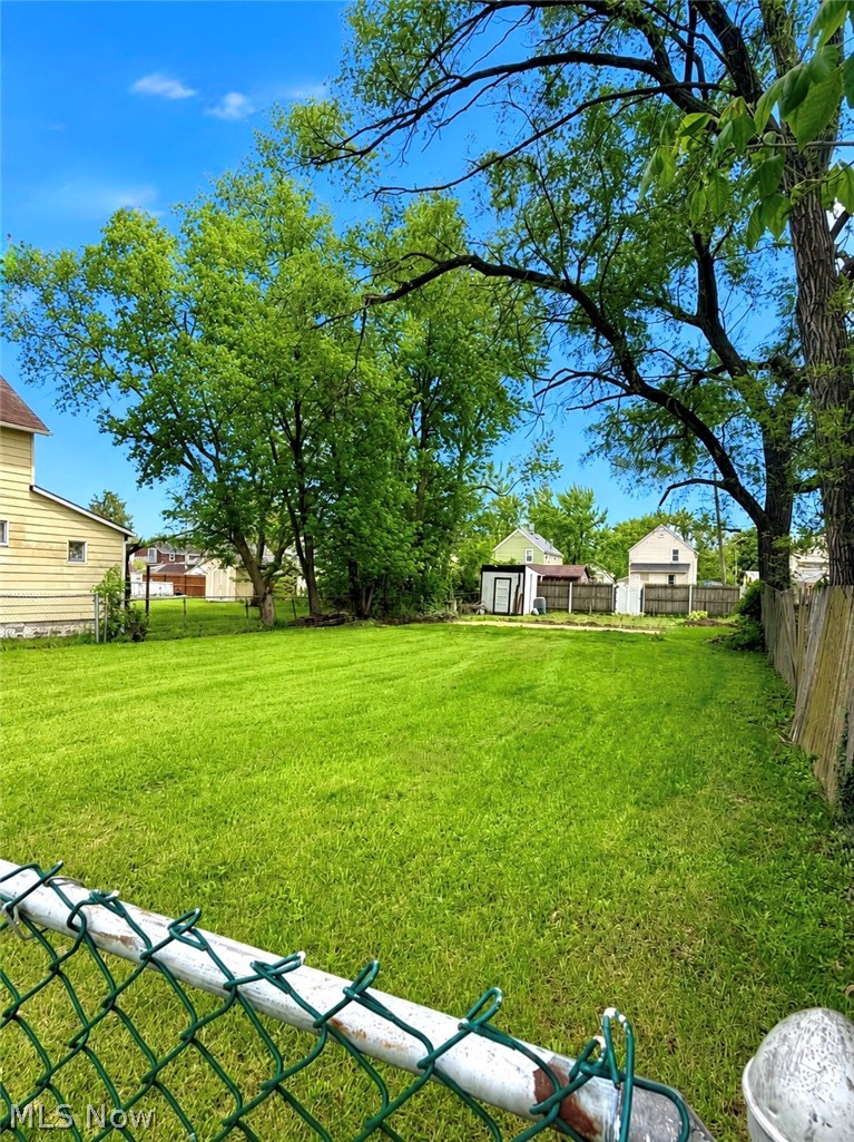 Affordable build opportunity in Lorain with utilities available at the site. This versatile parcel offers potential for a  single-family home, rental property, duplex (subject to zoning approval), garage, or long-term investment hold. Also ideal for gardening enthusiasts seeking additional outdoor space.  Property includes a small shed. Conveniently located near local amenities, schools, and major routes.