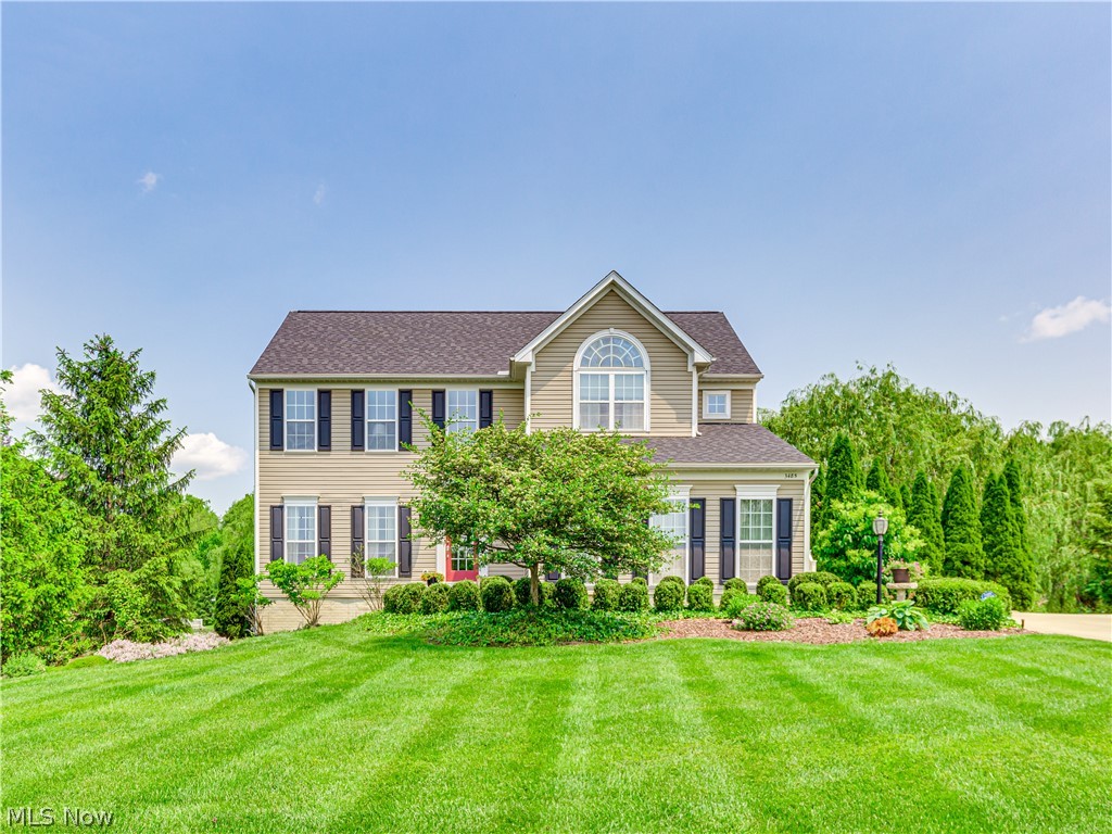 Impressive Colonial in beautiful Blossom Glenn.  Upon entering you will immediately  appreciate the attention to detail in the most up-to-date color pallete, and lighting fixtures.  Featuring 4 bedrooms, 2 full 1 half baths and an awesome finished lower level this incredible open floor plan includes an updated kitchen with white cabinetry, granite counter tops, stainless steel appliances, prep sink, and a sizable island. The sundrenched morning room overlooks a magnificent view of the park-like yard. The great room includes a charming brick fireplace. A formal living room and convenient first floor laundry completes the first floor.  The master bedroom includes a sitting area, massive walk-in closet, and ensuite bath. Three other bedrooms are also nicely sized and all have substantial closet space. The main bath completes the second floor.  A finished lower level offers a rec room, office, and is plumbed for an additional bath. The roof was recently replaced. A one year home warranty i