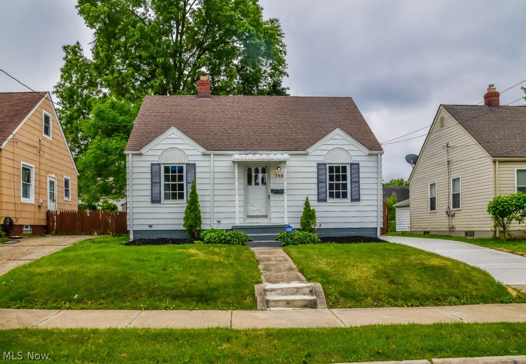 This beautifully remodeled Cape Cod is a great find in Firestone Park! Pack your bags and move right in and enjoy the updated interior with fresh paint and new flooring throughout. You'll love the new kitchen with white cabinetry, solid surface countertops, modern tile backsplash, and durable vinyl plank flooring. Two of the bedrooms are on the main level, as well as a refreshed full bath. Upstairs is a large bedroom with a ceiling fan, a nice size closet plus built-ins and eave storage. Cute curb appeal with a manageable sized backyard plus a garage and off-street parking in the drive. Book your appointment today!