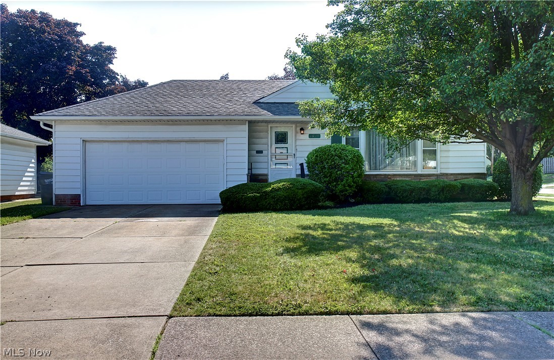 Well-maintained ranch offering 3 bedrooms, 1 full bath, and a basement half bath ready for completion. Hardwood floors main on the main level. The full basement provides ample storage or the potential for additional living space. The home has been well cared for and offers an excellent opportunity for cosmetic updates to suit your style. An attached 2-car garage and a spacious backyard that backs directly to a public park add to its appeal. Conveniently located in Mayfield Heights with easy access to shopping, dining, freeways, and the Mayfield School District. A solid home with plenty of potential.