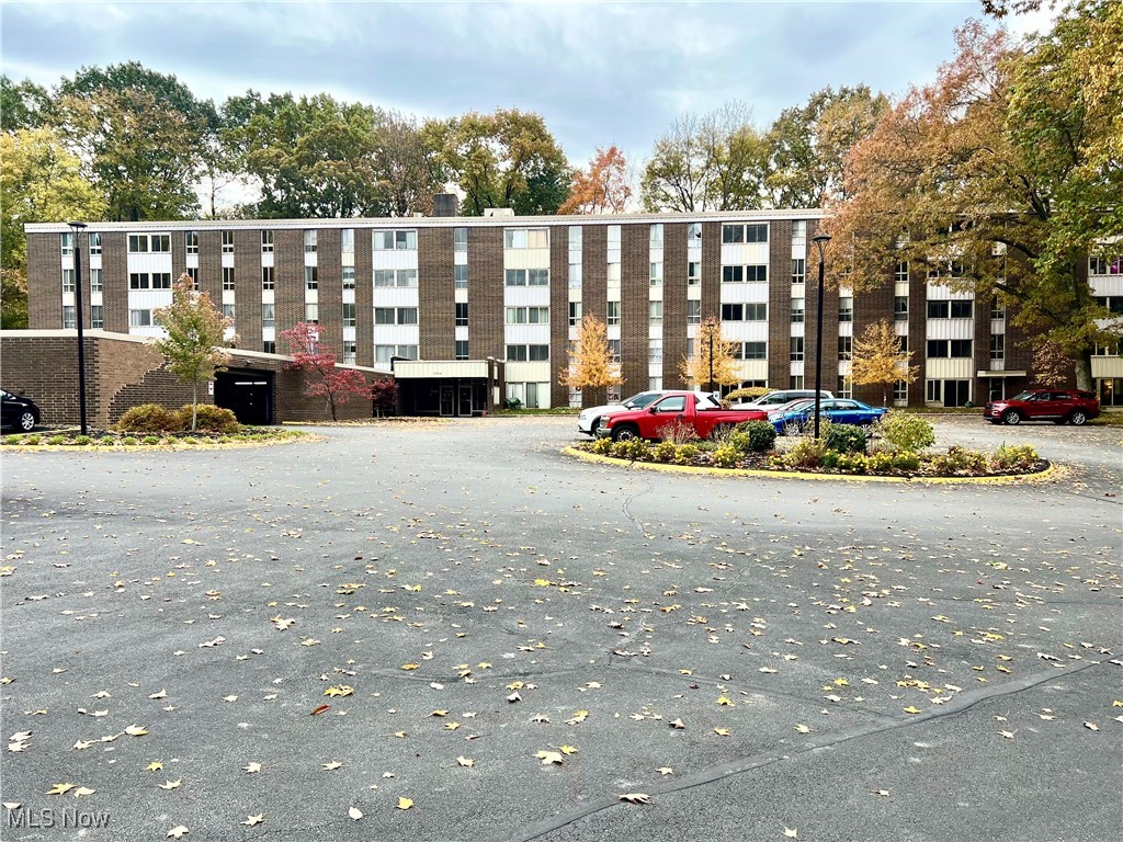 Location, Location! First floor condo just steps away from the lobby & features a 3 season sun room that walks out to the wooded grounds. Beautiful lobby offers secure entrance & attached garage. Spacious 2 bedroom, 1 bath in adult 55+ community. Kitchen features 2 refrigerators, tall custom oak cabinets and breakfast bar. Primary bedroom features walk-in closet in addition to 2nd closet. Second bedroom with nice size closet. New light fixture in dining room area. This unit needs some attention to make it your own. All utilities are included in the monthly maintenance fee including Internet & cable. Beautiful parklike setting features many amenities including heated inground pool, clubhouse, tennis / pickleball, bocce ball, fitness room, bbq areas, wooded areas & many sitting areas through out the complex. Nice parking lot & assigned garage space #122 and additional storage locker #43. Schedule a showing with your favorite realtor today.