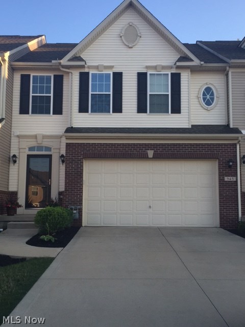 Beautiful condominium with open floor plan and many upgrades! Enjoy maple cabinets, granite counter tops and a large pantry in the kitchen. Open and spacious first floor has 9 ft ceilings, gas/stone fireplace and large windows with a view of the wooded lot. Upstairs you will find the master bedroom with two walk-in closets and a private bathroom with large soaking tub and dual sink vanity. The laundry room is conveniently located on the second floor along with the second full bathroom, two additional bedrooms, and an open loft area. Home is move in ready...new flooring installed on the entire first floor and custom wood blinds throughout.