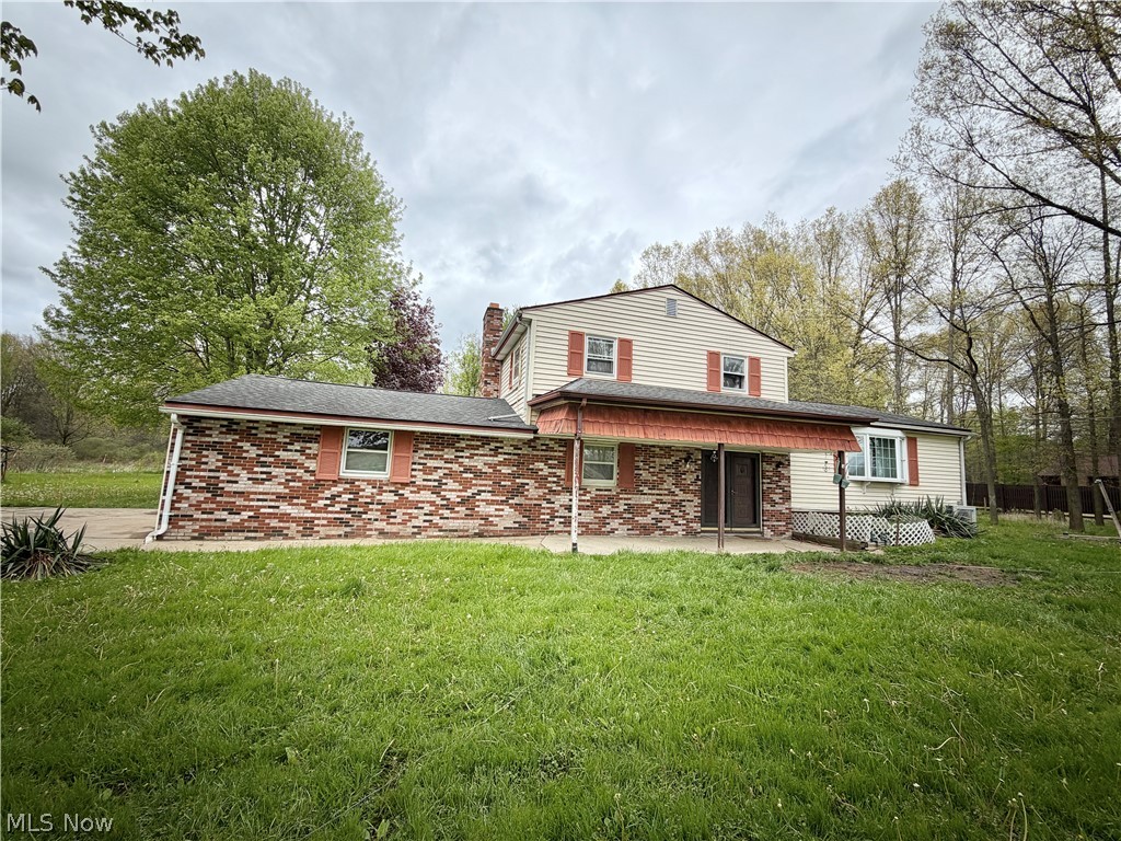 OWNER FINANCING / LAND CONTRACT POSSIBLE WITH A MINIMUM $20,000 DOWNPAYMENT ,Opportunity awaits on this scenic 8-acre country property, offering privacy, space, and the chance to create something truly special. This 3-bedroom, 1.5-bath four-level split with 1,776 square feet is a true diamond in the rough—with good bones, standout features, and room to make it your own.

Inside, you’ll find an updated kitchen, a welcoming family room anchored by a beautiful stone fireplace, and a versatile multi-level layout that provides comfortable living space along with a basement for storage, workshop space, or future possibilities.

Step outside and take in the peaceful setting—complete with a large rear deck overlooking your private acreage, a pond, and plenty of room for recreation, gardening, hobby farming, or simply enjoying the quiet beauty of country living. The combination of acreage, privacy, and natural surroundings creates a setting that’s increasingly hard to find, all while enjoying the convenience of city water and a great location with easy access to town.

The home could benefit from fresh paint, new floor coverings, and some minor repairs/TLC, but the upside is undeniable. Buyers seeking a turnkey, move-in-ready home may find other properties better suited to their needs, while those with vision and a desire to build equity will recognize the exceptional potential this property offers.

A rare opportunity to transform a hidden gem into a truly remarkable place to call home. A new heating and cooling system was installed in 2025, Agents read broker remarks prior to showings ! 24 hour notice to show please ! Being SOLD AS-IS buyer to due any due diligence prior to making an offer.