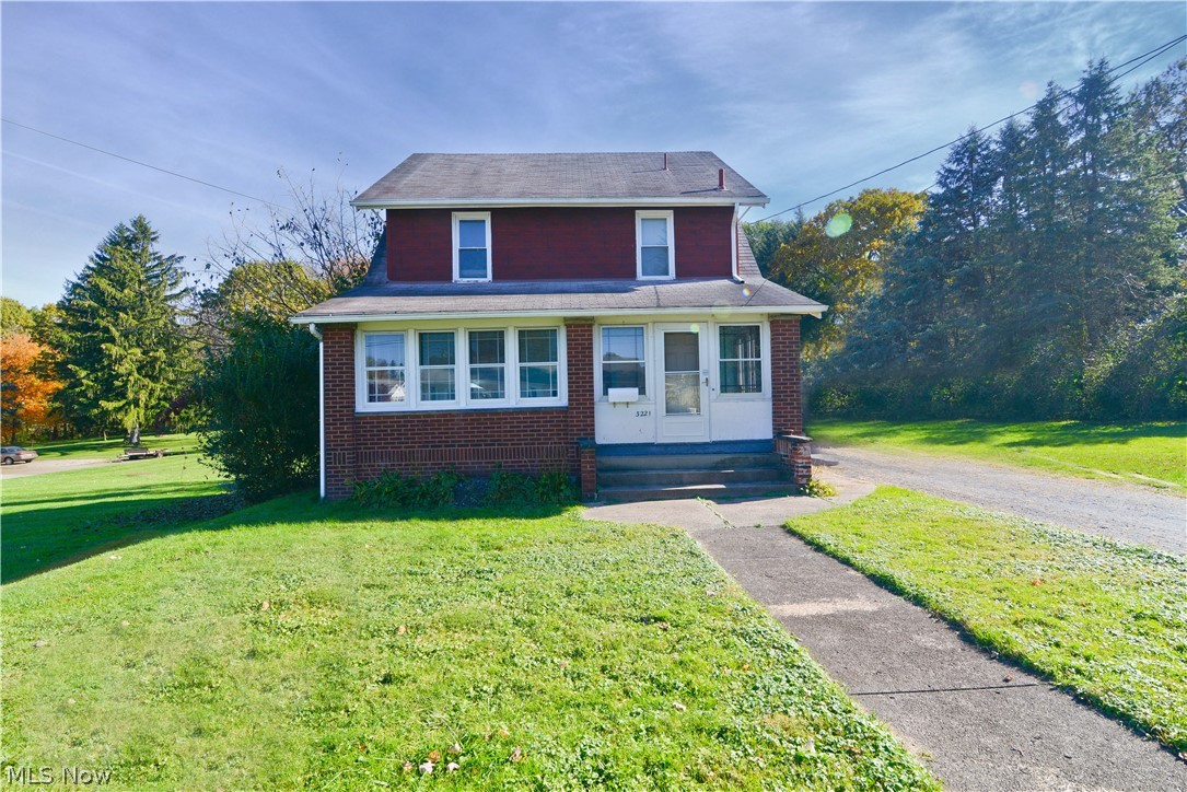 Opportunity is knocking if you always wanted to have an acre of property and live in the city! This home is situated on a gorgeous one acre lot that makes you feel like camping and bonfires in the back yard for days! Yes, this brick home needs quite a bit of updates on the inside, BUT if you aren't afraid of a little work this just might be the property for you! Pull into the driveway and walk up to an enclosed front porch. Inside is a formal foyer entry that opens to the living room. Spacious formal dining. Original kitchen. Appliances to stay. Upstairs are three spacious bedrooms and a full bath. The third floor is a huge attic, finish or use for storage! Large full basement with a stand alone shower and also a private toilet closet, plus tons of storage as well. Covered back porch. Don't miss the two car detached garage as well! Wide open space in the tree lined back yard. Original woodwork, and wood flooring needs some love. Ceiling repair needed in spots as well. Now's your chance