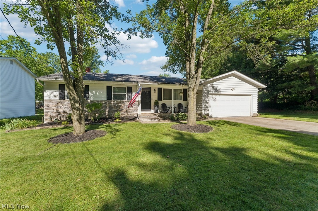 Welcome to your new home at 432 Mackinaw Ave in Bath, Ohio. This beautifully updated ranch-style residence lies in the highly sought-after Revere Local School District, offering a unique blend of comfort, convenience, and charm. As you step inside, you'll find a soothing color palette that enhances any decor. The home features three spacious bedrooms and two full bathrooms, with abundant natural light flooding every corner. The versatile floor plan is designed to accommodate a variety of lifestyles. Outside, the covered back deck is perfect for enjoying summer activities or taking in those cool evening breezes. The basement provides a blank canvas, ideal for hobbies or additional storage needs. Recent upgrades include a new furnace and A/C system, a new water heater, and an updated kitchen range and refrigerator. The primary bathroom has been remodeled to offer a modern, contemporary appeal. This gem is conveniently located near shopping, dining, and local parks, making it perfect for your next adventure. Don’t miss the opportunity to make this charming home your own.