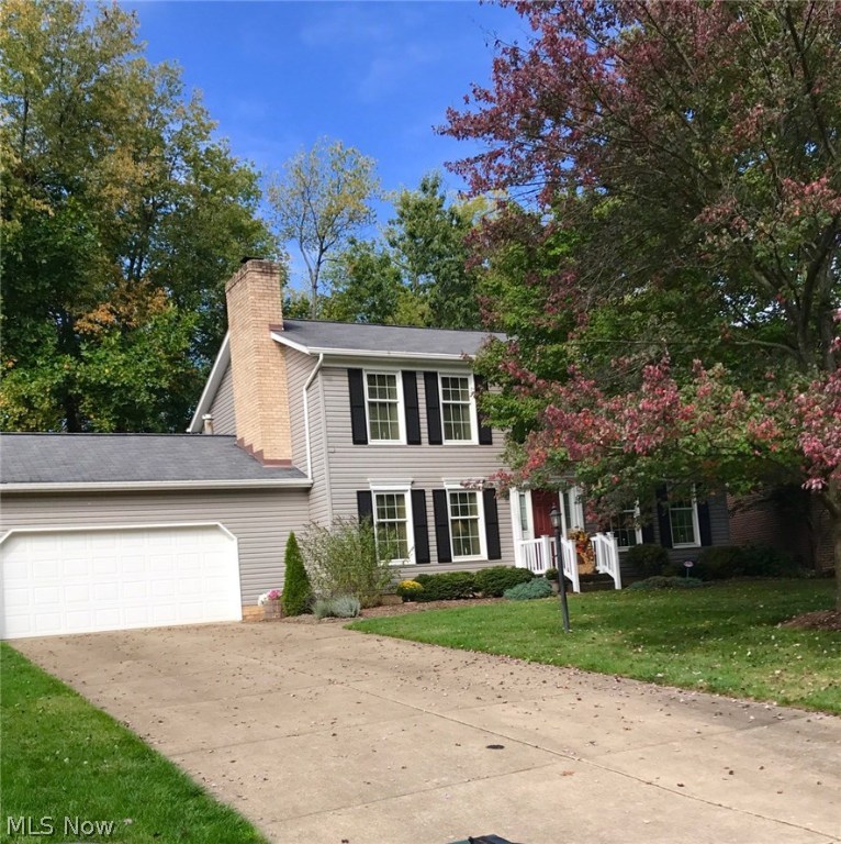 Beautiful 2 story home in North Canton.  This home offers an open floor plan, Family Room with gas fireplace and built-ins that leads into Kitchen with granite counters, tile backsplash and all top of the line stainless GE Profile appliances.  Dinette walks out to Deck overlooking beautifully landscaped private backyard with new  storage shed.  First floor Laundry.  Large Master Bedroom with His and Hers closets and Master Bath.  Recent updates include new 200 amp electric service, windows, siding, roof, furnace, air conditioning and new carpet in most rooms.  This home won't last!