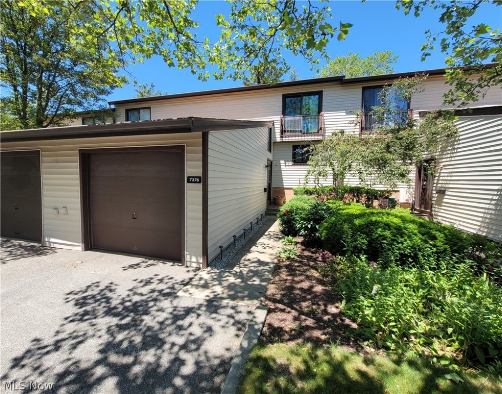 Welcome home to maintenance free living in Middleburg Heights! This 3 Bed/1.5 Bath Townhouse has everything you need with 1524 square feet of living space in Pine Hill Subdivision, with attached one car garage. Enjoy the open design of the oversized eat-in granite kitchen with pass through window that opens into the dining & living room. Beautiful entry with 2-story foyer, and neutral colors and newer carpet throughout (2019). All appliances stay, including the washer/dryer. Spacious living room and formal dining space, includes the 42" electric recessed Wall Fireplace heater with adjustable flame colors/speed. Sliders from living room open to a private privacy fenced patio, perfect for entertaining, gardening, or just a relaxing space to escape! Convenient first floor half bathroom. Three generous bedrooms on the 2nd floor with convenient laundry area and duel vanities all connected to the master suite with walk-in closet and sliding glass rapunzel door. Roof is only 6 years old, HOA