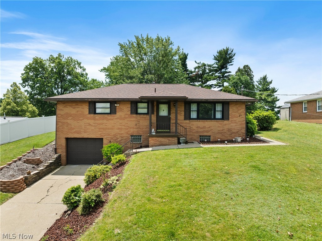 Welcome to 31 Highview Circle! This well-maintained brick ranch offers the perfect combination of comfort, functionality, and outdoor enjoyment. Nestled on a beautifully landscaped lot with mature trees and a private backyard, this 3-bedroom, 1.5-bath home has been lovingly cared for and is ready for its next owner. Step inside to find a spacious living and dining area filled with natural light, creating a warm and inviting atmosphere. The kitchen offers abundant cabinetry, ample counter space, and a practical layout that makes meal preparation a breeze. Just beyond the dining area, you'll discover the true highlight of the home, a stunning enclosed sunroom featuring walls of sliding glass doors that allow you to enjoy the beauty of every season. Open the doors on pleasant days to welcome fresh air and sunshine or relax in comfort while watching the snowfall during the winter months. The lower level provides exceptional versatility with a finished family room ideal for entertaining, relaxing, or creating a recreation space. Additional rooms offer a dedicated laundry area, generous storage space, and the potential to finish even more square footage to suit your needs. The built-in garage provides convenient parking and additional storage for tools, hobbies, and outdoor equipment. Outside, you'll appreciate the peaceful backyard setting complete with mature shade trees, attractive landscaping, a storage shed, and plenty of room for pets, gardening, outdoor gatherings, or simply enjoying the scenery. Whether you're looking for a move-in-ready home or one with opportunities to add your own personal touches, this property offers incredible potential in a desirable setting. Contact your agent today to schedule your private showing!