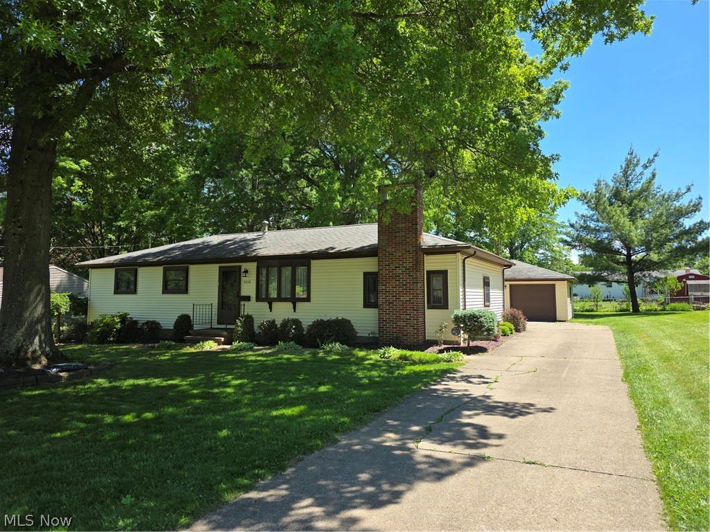 Desirable NE location -  Ranch - Move-In Ready!  Located in a sought-after NE neighborhood, this well-maintained ranch home offers comfortable living, a functional floor plan, and plenty of space both inside and out.  The bright living room features a beautiful bay window that fills the home with natural light. The kitchen comes complete with appliances and opens to a cozy dining area with a charming mini bay window, creating the perfect spot for everyday meals.  A welcoming sun room provides additional living space and features doors leading to the patio, while the family room with a fireplace offers a warm and inviting place to gather with family and friends. The main level includes a full bath with a shower stall, and the waterproofed basement adds exceptional versatility with an additional full bath, workshop area, and abundant storage space. 2 car detached garage, newer windows throughout, nice size yard & great neighborhood!  Whether you’re looking for a place to entertain, relax, or simply enjoy single-floor living, this ranch offers endless potential and a location you’ll love.