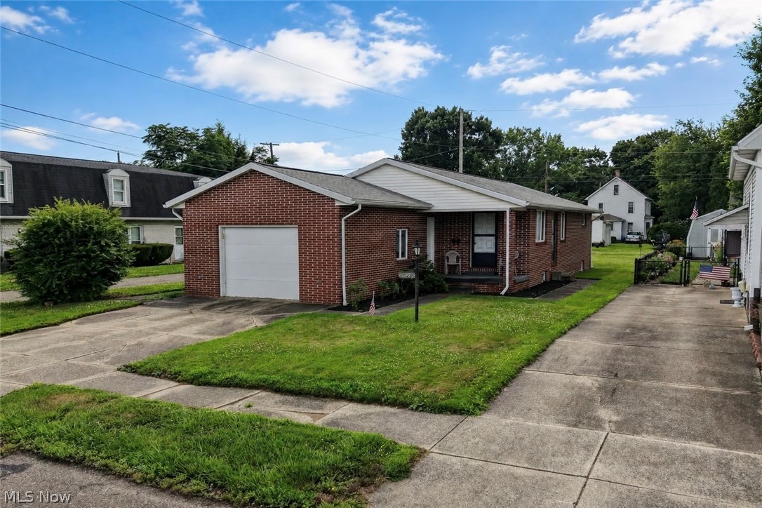 An open concept solid brick ranch home with one car attached garage and 50 x 150 corner lot.  Spacious rooms and lots of storage.  The large living room and dining room are the 1st rooms when you walk in the front from the porch.  Custom cabinetry and with plenty of cupboards and counter space.  Included are the stove and dishwasher.  The family room has a side door and a nice place to relax.  The primary bedroom has his and her closets.  A 2nd bedroom and full bath on the main floor.  In the lower level is a recreation room that could be used as an office or additional family room/bedroom, complete with a competition pool table, 2 leather chairs, pool sticks and cover.  A 3rd large bedroom, full bathroom and laundry are in the lower level.  A wood burner is in the lower level but seller has never used.  Access to the basement is either from the garage or lower level.  Roof 2023; Leaf guard 2018; furnace and A/C 2025; HWT 2023; Utilities average $200 electric/water/trash.