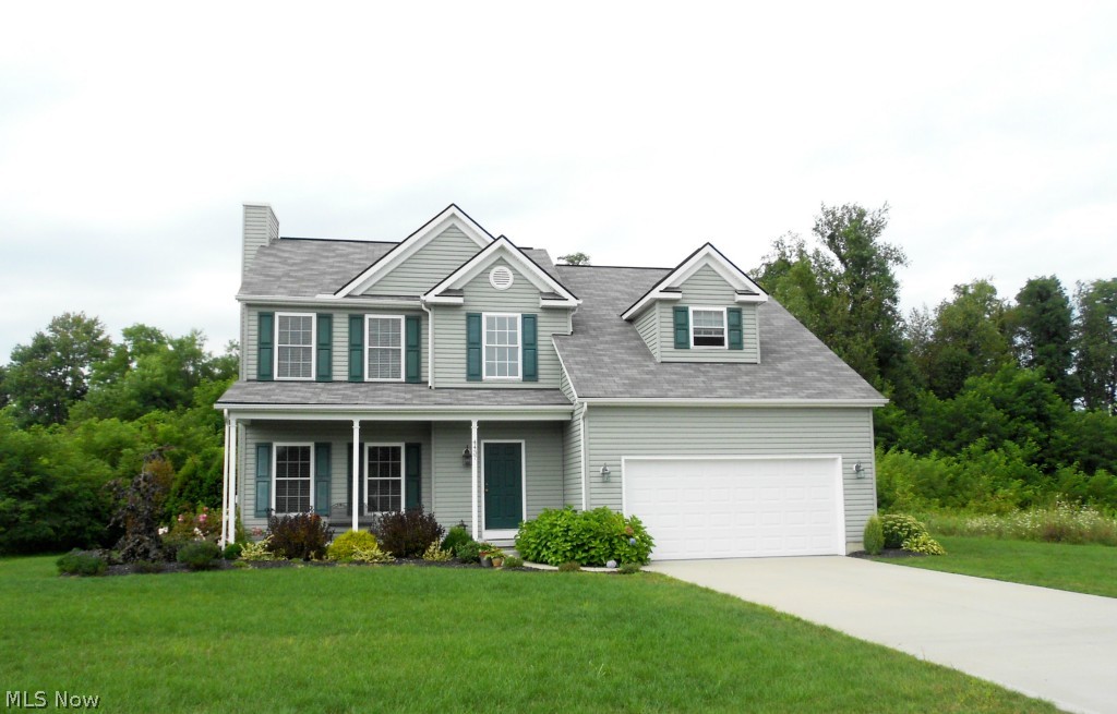 Captivating colonial has been tastefully decorated with neutral colors and is just waiting for new owners.  The two story foyer welcomes you to the great room with gas fireplace and french doors that lead to the 2-tiered deck.  An attractive open floor plan offers a nice eating area and kitchen with plenty of cabinets with pull out shelves, granite countertops, travertine backsplash, recessed/dimmer switch lighting, SS appliances and a nice pantry.  Both the convenient first floor laundry and powder room feature travertine tile floors.  The master suite has one of the largest walk-in closets I have ever seen (7 x 15) and includes a master bath with soaking tub, double sinks, and walk in shower.  The other 2 bedrooms are good size and have ample closet space.  The basement has been pre-plumbed for a full bath, ideal for creating a future additional living space.  A totally private fenced backyard with custom built stamped concrete fire pit and a vegetable garden complete this home.  Pro