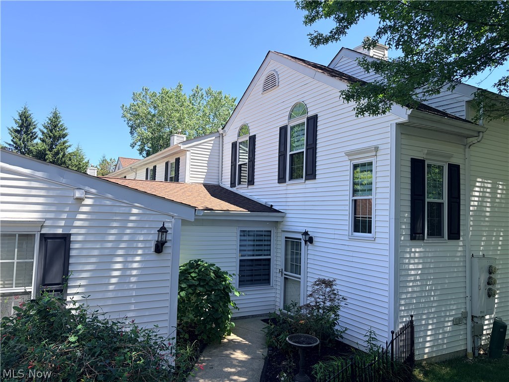 Easy living in this low-maintenance 2 bedroom, 2.5 bath end unit townhome.  Once a former model home, this 1572 sq ft home features a thoughtful design with wet bar, extra closet space for storage, and an enclosed fenced walkway to the front door.  Enjoy a host of recent updates, including updated carpeting, remodeled half bath and main full bath, newer washer & dryer, patio slider door and new front storm door with built-in screen.  Additional thoughtful improvements include a touchless kitchen faucet, updated door knobs and light switches, master bedroom closet organizer and newer frost freeze exterior hose hookups.  Step outside to embrace the community's resort-style amenities, featuring an in-ground pool, well equipped fitness center, clubhouse, community playground, pickleball and basketball court-all within walking distance.  Tucked in one of Brecksville's most popular communities, you're just minutes away from the vibrant and upcoming Valor Acres and new Sherwin Williams complex.  Located equidistant between Cleveland and Akron, this Grand Bay townhome is perfect for first time homebuyers, those downsizing or anyone seeking updated living in a prime spot.  This unbeatable location is just a short drive to the Cuyahoga Valley National Park, the charming Brecksville downtown area with boutique shops and dining and sought after schools.  This well cared for gem is ready for its next owner!