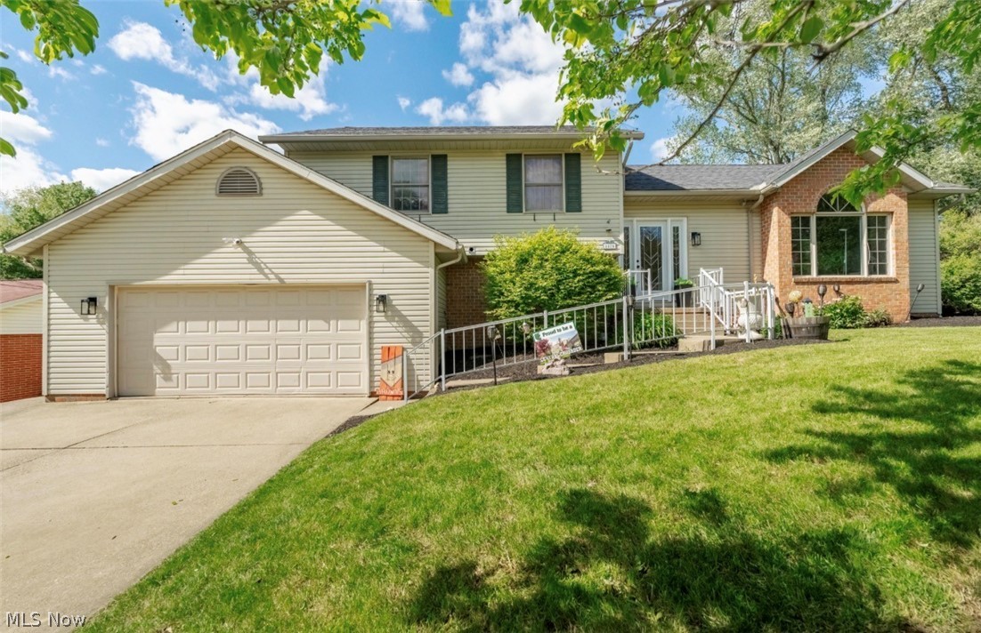 Welcome to 1870 Stoner Ave. NE!  A beautifully maintained home, that offers a full in law suite (equipped with full kitchen and bath) or teenage dream wing.  The perfect blend of comfort, space, and everyday functionality. Nestled on a generous, fully fenced in lot in an established neighborhood, this spacious 4-bedroom, 4-bath residence features over 2,900 square feet of living space designed for both relaxing and entertaining.  
Step inside to discover inviting open concept  living areas filled with natural light, a warm and welcoming fireplace, stunning light fixtures, and a layout that flows effortlessly from room to room. The 3 season room includes giant hot tub that stays with the property. Outside, the expansive yard offers plenty of room for gatherings, play, or simply enjoying peaceful Ohio evenings.

Whether you’re hosting family holidays, enjoying quiet mornings at home, or creating lasting memories with loved ones, this property delivers the space and charm to make it all possible. Conveniently located near shopping, dining, parks, and schools, 1870 Stoner Ave. NE is more than just a house — it’s a place to truly feel at home  Open enrollment is optional if desired -as well as private school choices. Roof in 2026 , natural gas generator to stay.
