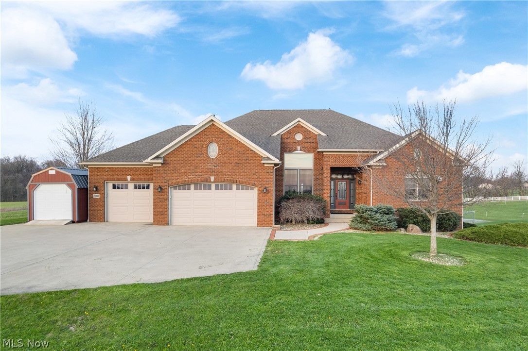 ALSO AVAILABLE AS HORSE FARM ONLY WITHOUT HOUSE - SEE MLS #5200357! Welcome to this distinguished, turnkey equestrian estate offering a rare blend of luxury living and professionally designed horse facilities. The completely updated 3 bed, 4 bath, all-brick residence spans over 3,700 SF & features a fully finished walk-out basement. High-end finishes define every space, including a stunning remodeled chef’s kitchen with hidden butler’s pantry, elegant primary suite with oversized walk-in closet room, & private deck overlooking the farm. A beautiful stone natural gas fireplace, soaring ceilings, & incredible hardwood floors accent the main living area. With just part of the horse amenities previously rented at $84,000/year for 2 years, this property also offers incredible income-producing potential. The equestrian facility exceptional and meticulously maintained. A 70x140' heated dust-free indoor arena, expansive 100x300' outdoor arena, and professionally designed mountain trail course create endless training opportunities. The main barn offers 27 stalls with automatic waterers and mats, plus heated wash stalls, 3 heated tack rooms, feed rooms, and heated bath. An additional 8 exterior shed-row stalls and numerous safely fenced pastures and all-weather turnouts—all with automatic waterers—ensure optimal functionality and horse safety. The property also includes 10+ acres of alfalfa/timothy hay fields and a 1 bed/1 bath apartment ideal for farm help or trainer accommodations. Additional features include RV parking/hookup, workshop, EV charging station, dog wash station, generators, free internet, hay storage for 2400+ bales, optional additional 5-acre lot, and more! Every element has been thoughtfully designed for comfort and performance. This estate stands among NE Ohio’s finest equestrian offerings - a truly unparalleled opportunity for the discerning horse professional or enthusiast.
