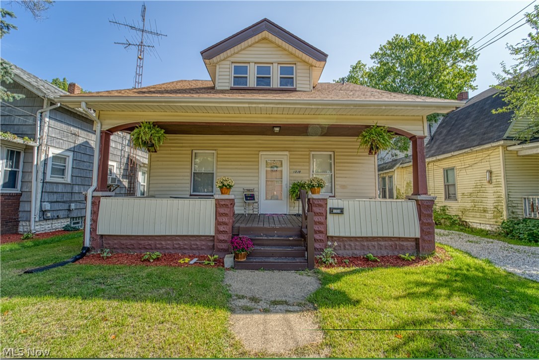 Vinyl siding, dimensional shingles, vinyl windows, newer furnace, and the best for last, 1.5 bathrooms!!  Not the crappy random toilet in the basement kind either.  Half bath on the second floor, full bath on the main floor.  This guy is roomy, has neutral paint tones through-out and has beautiful original woodwork.  If cooking is your thing, this kitchen will surly impress with all its cabinets, counter space and SS appliances.  It's "ready to rumble" as cookie and pie seasons are right around the corner.  Front porch is a great place to people watch or socialize with the passerbyers.  Not in to socializing, the back covered patio may be more your speed.  No neighbors to deal with behind you.  Great place to unwind after a hard days work.  All of this and under 80,000?  You betcha!! Buy now and be in before Santa starts his engine..........ho ho hurry!!!
