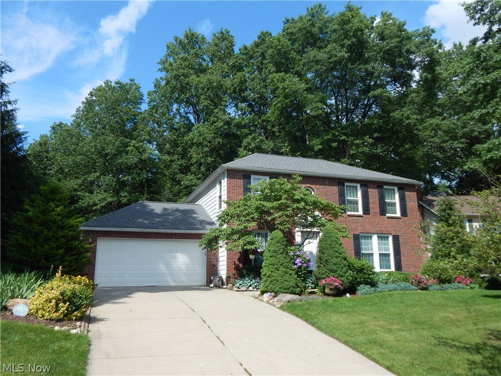Come home to Brick and vinyl   Colonial on beautiful cul-de-sac setting. Private  manicured rear lot. Spacious deck overlook plush summer green landscaping. Two story foyer offering large living area, family room along with formal dinning. Eat in kitchen, full wall size pantry . Enjoy the many options with freshly installed carpet in lower level recreation room. Master bath, second floor laundry are sure to please.