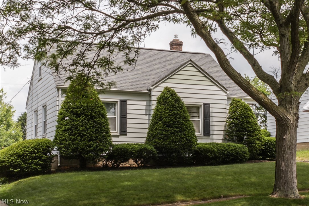 Absolutely charming and meticulously maintained Cape available on a lovely street in Firestone Park!  Enjoy the beautifully refinished hardwoods in the living room. Bright and sunny eat in kitchen.  Updated bathroom, and nicely sized first floor bedrooms.  Upstairs is a large bedroom with a built in twin bed (could be 2 built in beds again!) and a great amount of floor space. Plus, you can spread out and enjoy the bonus space in the rec room downstairs!!  Detached garage and private and spacious back yard.  This home has a TON of upgrades!!  Brand NEW furnace and A/C!  Replacement windows throughout.  Waterproofed basement!  So much house for the money!  Dont miss it!