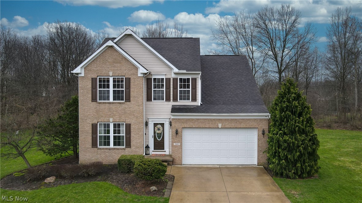 Turn-key contemporary home tucked away in a quiet neighborhood walking distance to Massillon Intermediate & Junior High. Enter through the open foyer which leads into a spacious formal dining area, powder room, and onto the open main living area with a floor-to-ceiling stone fireplace and the kitchen. Sliders from the kitchen take you to a large deck and private wooded back yard oasis with a fire pit and plenty of room to entertain. The first level is rounded out by a laundry room and access to the attached 2-car garage. Head upstairs where you're greeted by a stunning Owner's Suite with en suite bathroom and 3 additional spacious bedrooms and another full bath. The sprawling partially finished basement offers a full wet bar/lounge, an additional living space, a half bath, and a large storage area. The seller is offering a 1-year limited home warranty for added peace of mind. Nothing to do but move in!