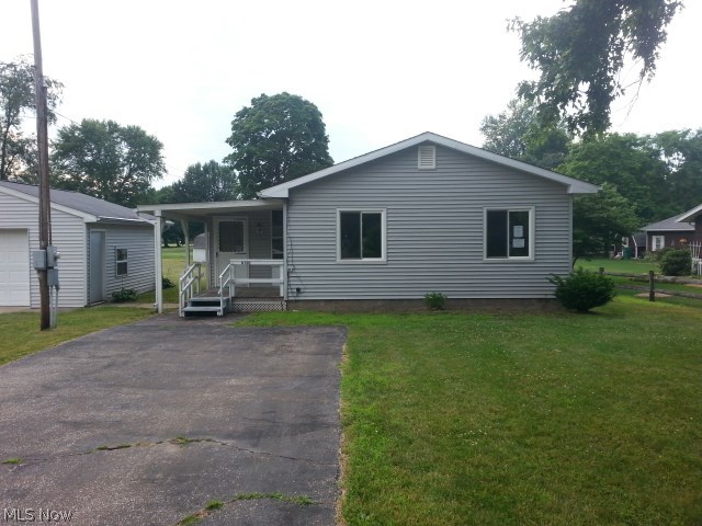 A cute ranch home in a nice neighborhood location. This home has a great interior layout that features three bedrooms, one full bathroom, a kitchen, dining area, family room, and much, much more! Detached 2-car garage, a second detached garage and a shed in the back yard! An enclosed sided porch and a large back yard! Good neighborhood location near downtown Ashtabula! HUD homes are sold AS-IS. Buyer is responsible for due diligence and inquiry of all property information/condition. Buyer is responsible for any/all inspections and related costs and is to assume any/all POS violations if applicable. Ask your agent for details and submit offer for this property on line. HUD property case #412-598156.