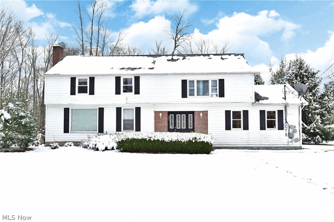 Need more space inside and out? Look no further, this large Howland Township home has it all! Combining a spacious and updated four-bedroom layout and a massive 40’x30’ heated outbuilding. As you make your way into the home the large living room can be found with refinished hardwood flooring and a fireplace. The refinished hardwood flooring continues to flow into the formal dining room. The spacious eat-in kitchen has an array of cabinets, tile flooring, and a breakfast bar. The step-down to the large family room gives way to the second fireplace and provides access to the rear private patio, composite deck, and fire pit. The first-floor bathroom offers a granite vanity top and shower. Upstairs, the huge master bedroom has cathedral ceilings and plenty of private closet space. The three additional bedrooms are nicely sized and offer great closet space. The second full bath completes this floor. Outside, the 1+ acre corner lot offers an oversize concrete driveway that leads to the attac