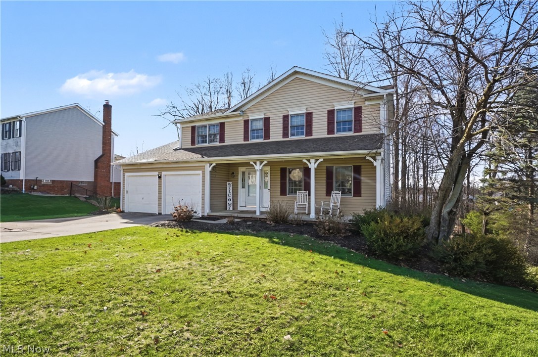 Welcome to this spacious colonial home nestled on a generous lot in a desirable Macedonia neighborhood. Offering approximately 2,628 square feet of living space, this well-maintained home features four bedrooms, and three bathrooms, providing plenty of room for comfortable everyday living and entertaining. Step inside to find inviting areas designed for both relaxation and gathering. The home includes multiple living spaces, living room, dining room and including a family room with a cozy fireplace, perfect for Ohio evenings. The functional layout offers great flow between rooms, ideal for entertaining guests or spending time with family. The fabulous open eat in kitchen offers abundant of cabinets, island, and doors to the deck that creates the perfect space for summer barbecues, outdoor dining, or simply relaxing while overlooking the spacious backyard. Upstairs you will find four bedrooms and two full bathrooms. The lower level has more room for an office, storage, etc. and door to the backyard. Nothing to do but move right in!