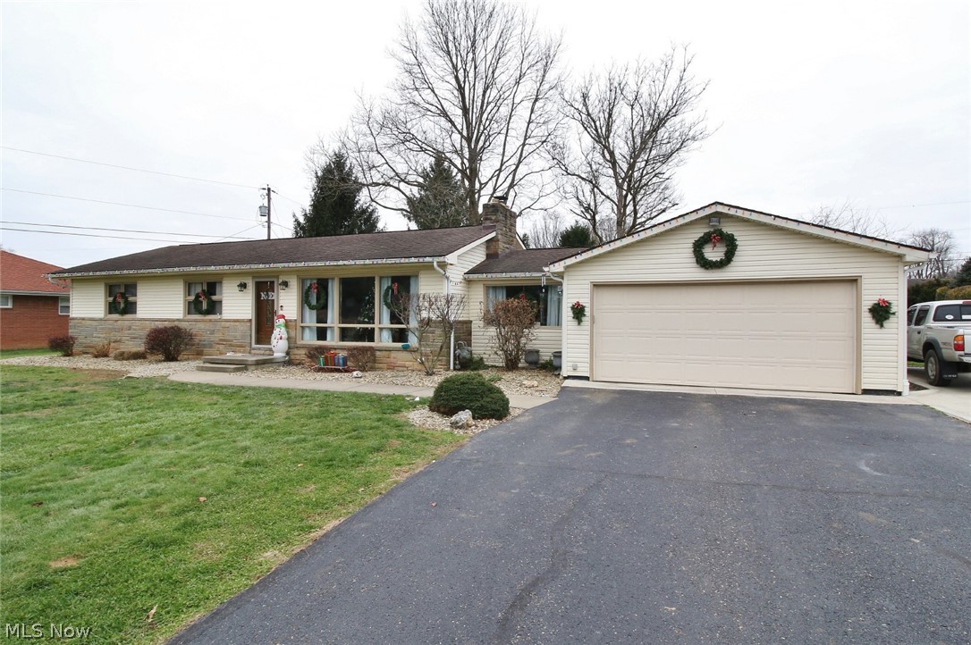 Charming home in Willow Lakes subdivision that is move in ready!  Gorgeous kitchen upgrades by Zanesville Fabricators including cabinets, and Cambria quartz countertops. Appliances approximately 1 year old, vinyl plank flooring. Oak hardwood flooring throughout the house, and added bonus with finished breezeway that has been converted to a sitting room. Partially finished basement with additional bedroom and full bath.  Lennox gas furnace.  Nice low maintenance lot, and convenient location within minutes to all shopping, dining, and medical facilities!   Couch in basement to stay. Possession shall be negotiable.