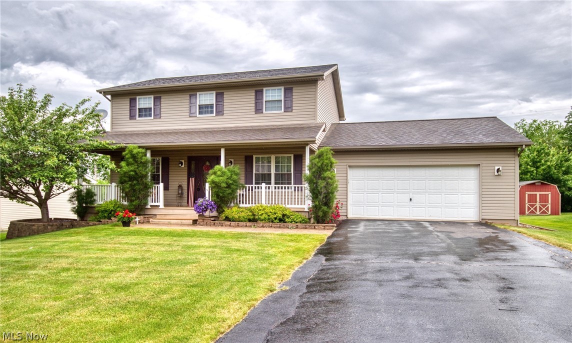Now is your chance  to own a home in Columbiana, voted the ‘Nicest Place in America’ by Reader’s Digest in 2019! This 1716 square foot, open concept, colonial has been freshly painted and is ready for you. Family get-togethers will be a snap with the large eat-in-kitchen with island or formal dining room to entertain in. Or make yourself at home in the large living room. Half bath downstairs as well. Master bedroom boasts a 7.2x7.11 walk in closet and has a master bath. Two more bedrooms and another full bath upstairs. Who doesn't love more living space?!  Finished rec room in the basement features built-in shelves. Perhaps the perfect place to watch tv or turn it into the man cave you've always wanted. Enjoy the view from the lovely front porch or perhaps have a barbeque on the vinyl back deck. You've picked a winner!