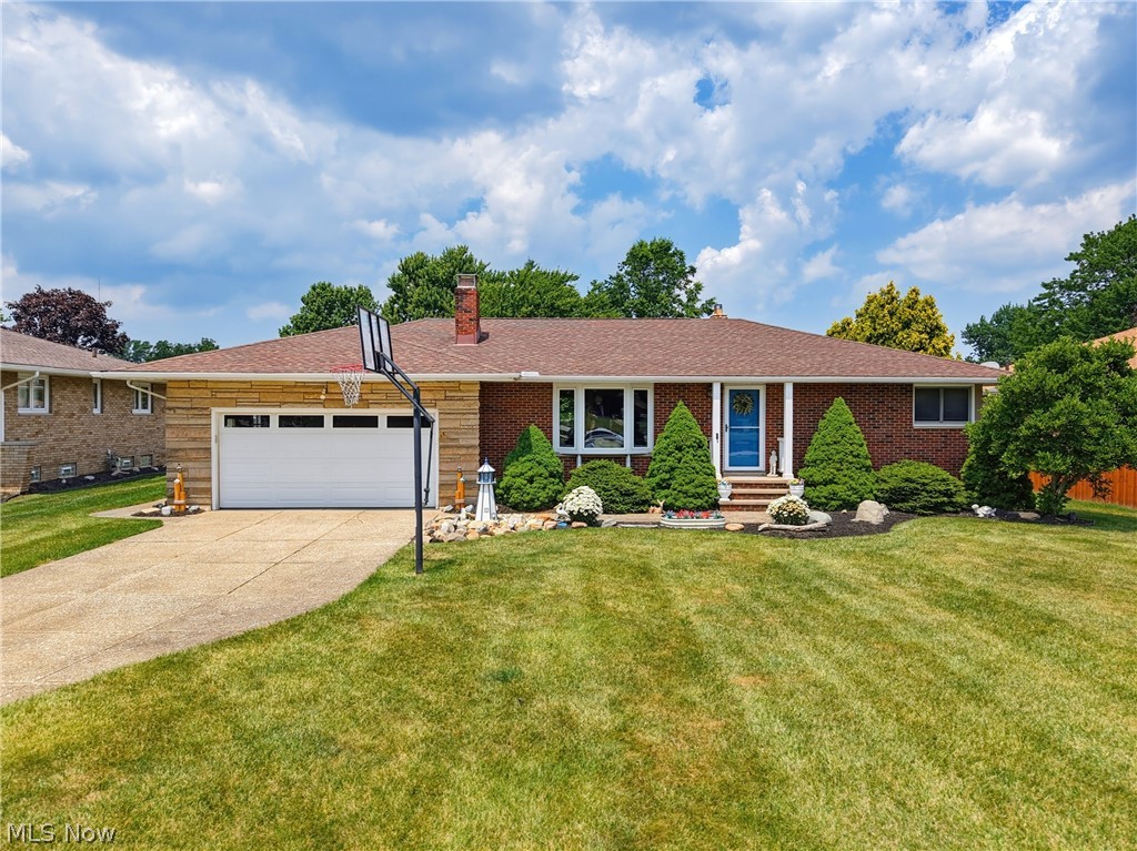 Welcome home to this beautifully updated 3-bedroom, 2 bath ranch in the heart of Seven Hills! This move-in ready home offers the perfect blend of charm and modern updates, featuring hardwood floors throughout the main level, an updated main bathroom, and a spacious layout designed for comfortable living. The kitchen boasts newer appliances, custom wood cabinetry, and flows seamlessly into the living and dining areas. PLUS, you will LOVE the CUSTOM mud room off the garage and kitchen! Enjoy cozy evenings by one of two fireplaces, one on the main level in the living room, and the other in the versatile finished lower- that's perfect for entertaining, a home office, or guest space. You Weill LOVE the covered deck, overlooking the beautiful back yard. Major updates include a newer roof, newer windows, and a hot water tank replaced in 2024, providing peace of mind for years to come. Additional shower in lower level! One year limited home warranty provided, America's Preferred Home Warranty! Don't miss your opportunity to own this well-maintained home in one of Seven Hills' most desirable locations!