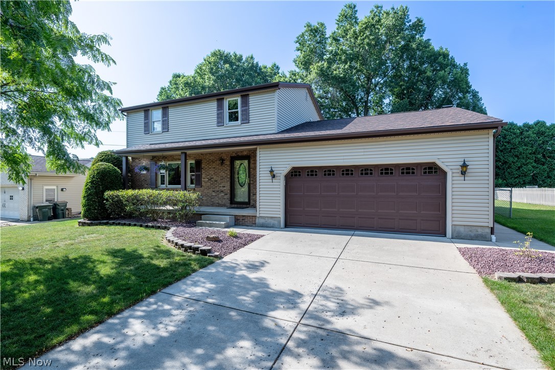 Beautifully maintained 3-bedroom, 1.5-bath home nestled on a quiet cul-de-sac street. Designed for both everyday living and entertaining, this home features a spacious living room, formal dining room, and an inviting family room with a brick fireplace and sliding doors leading to the backyard patio. The kitchen offers ample cabinet and counter space with newer appliances, while the beautifully remodeled full bath adds a stylish, modern touch. Recent improvements include a new roof (2026) and electrical panel (2025), providing added peace of mind. Step outside to enjoy the large, fenced backyard with mature trees and plenty of room for entertaining, pets, or play. Additional features include plaster walls, an attached two-car garage, and a well-maintained interior. Combining generous living space, thoughtful updates, and a great location on a desirable cul-de-sac, this home is ready for its next owner.